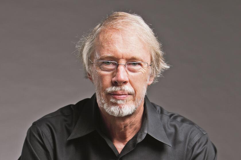 Seated portrait of author Charles Baxter