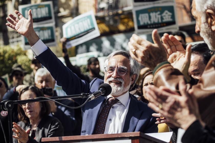 San Francisco District 3 Supervisor Aaron Peskin waves to supporters at a kickoff event for his mayoral campaign at Portsmouth Square in the Chinatown neighborhood of San Francisco, Saturday, April 6 2024. (Stephen Lam/San Francisco Chronicle via AP)