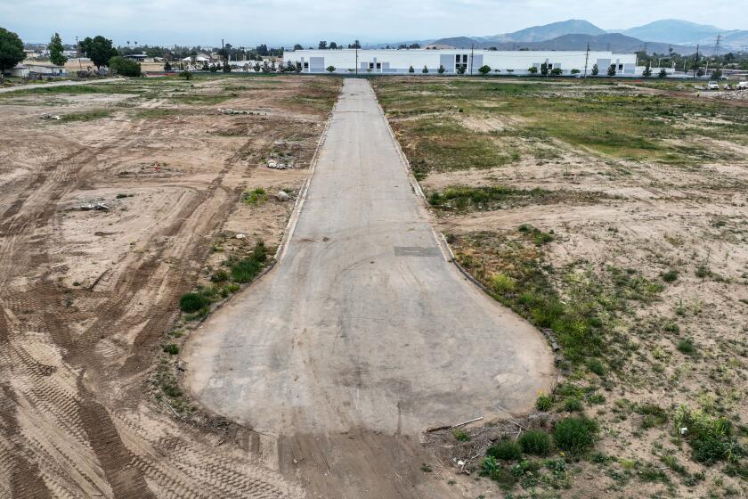 BLOOMINGTON, CA MAY 16, 2024 - In unincorporated Bloomington, more than 100 homes being razed for more Inland Empire warehouses. Developer Howard Industrial Partners is building a 213-acre warehouse project near homes and schools. (Robert Gauthier / Los Angeles Times)