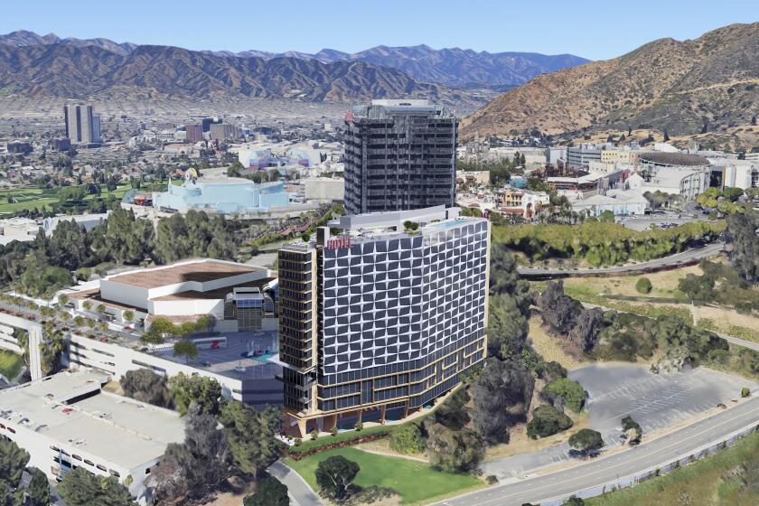 Rendering of a planned 18-story, 395-room addition to the existing 24-story Hilton Universal City Hotel in Universal City.