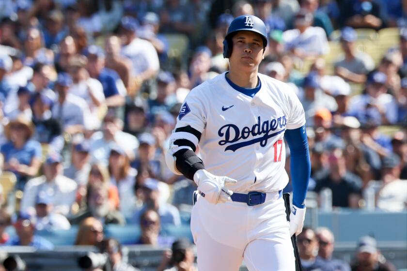 LOS ANGELES, CALIFORNIA - OCTOBER 14: Shohei Ohtani #17 of the Los Angeles Dodgers reacts.