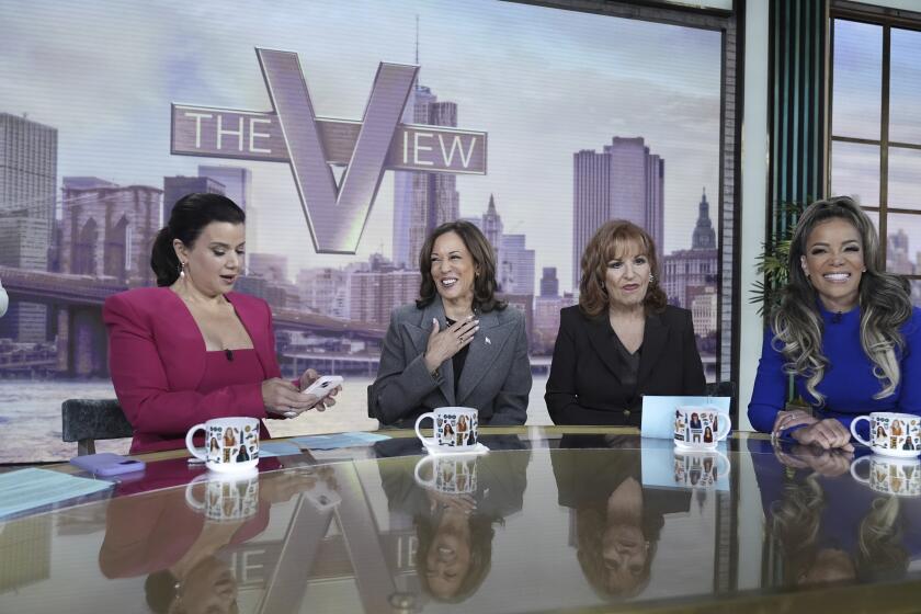 Democratic presidential nominee Vice President Kamala Harris chats with the hosts during a commercial break at The View, Tuesday, Oct. 8, 2024, in New York. From left are Ana Navarro, Harris, Joy Behar and Sunny Hostin. (AP Photo/Jacquelyn Martin)