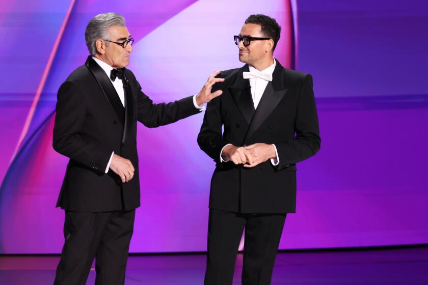 LOS ANGELES, CA - September 15, 2024 - Eugene Levy and Dan Levy during the 76th Primetime Emmy Awards at the Peacock Theater on Sunday, September 15, 2024 (Robert Gauthier / Los Angeles Times)