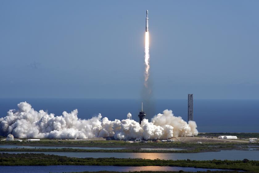 A SpaceX Falcon Heavy rocket with a NASA spacecraft bound for Jupiter lifts off from Kennedy Space Center.