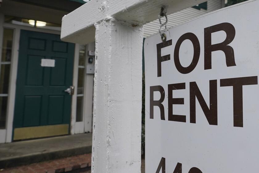 FILE - In this Jan. 27, 2021, file photo, a "For Rent" sign is posted in Sacramento, Calif. A popular notion that there was a mass exodus from California last year is wrong, according to research from a nonpartisan think tank. Most moves during 2020 happened within the state, the California Policy Lab said Thursday, March 4, 2021. (AP Photo/Rich Pedroncelli, File)