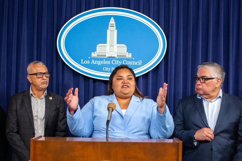 Los Angeles, CA - October 15: Carlos Vaquerano, (L) executive director of Clinica Romero and Salvad